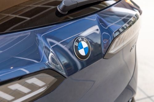 Close up of BMW emblem on vehicle